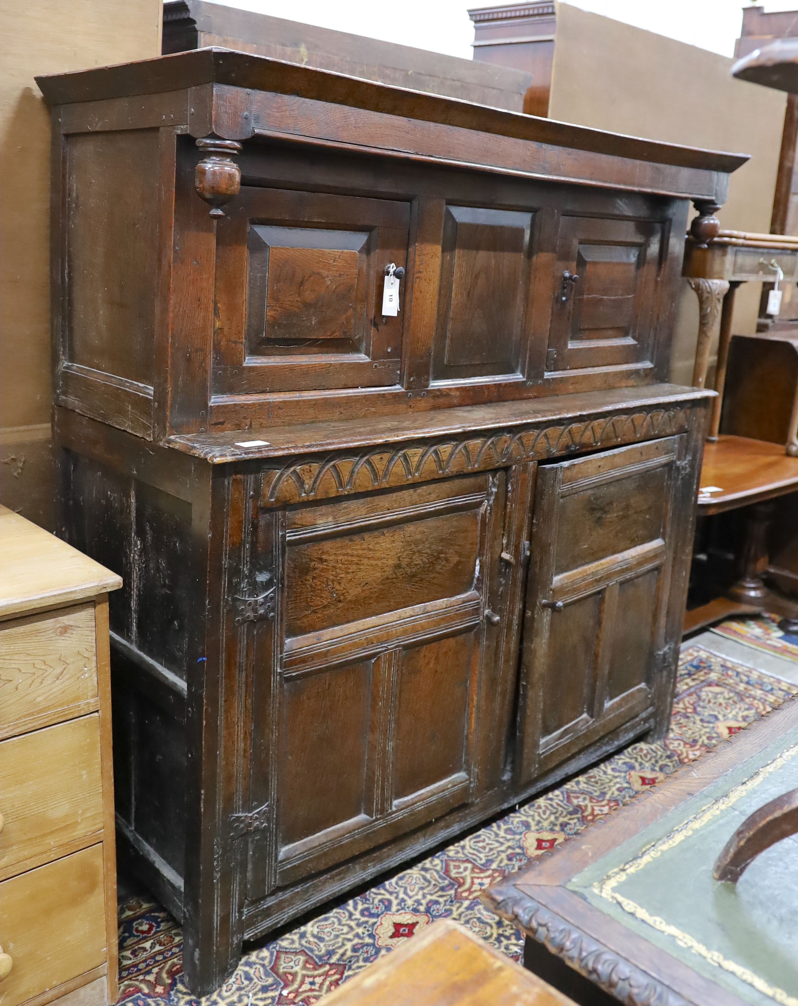 An 18th century oak court cupboard, length 147cm, depth 58cm, height 152cm